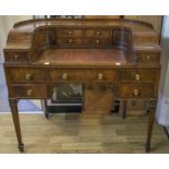 CARLTON HOUSE DESK, early 20th century mahogany with superstructure of doors,