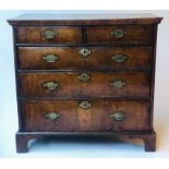 CHEST, early 18th century Queen Anne figured walnut with two short above three long drawers,