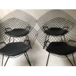 AFTER HARRY BERTOIA DIAMOND STYLE CHAIRS, a set of four, black wirework, 77cm H.