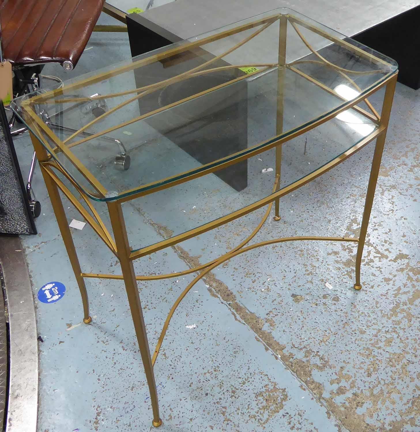 CONSOLE TABLE, bow fronted gilt metal with two tier glass shelves, 74cm x 44cm x 74cm H.