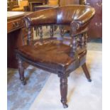 VICTORIAN DESK CHAIR, walnut with antique tan brown and studded hide leather with rounded back and