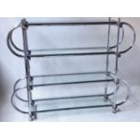 DISPLAY STAND, architectural chrome tubular with four glass shelves, 170cm x 128cm H x 42cm. (with