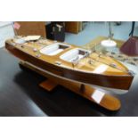 RIVA AQUARAMA MODEL BOAT, on stand, 60cm x 18cm x 23cm.