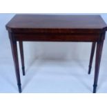 CARD TABLE, George III mahogany and ebony inlaid with canted foldover baize lined top and X