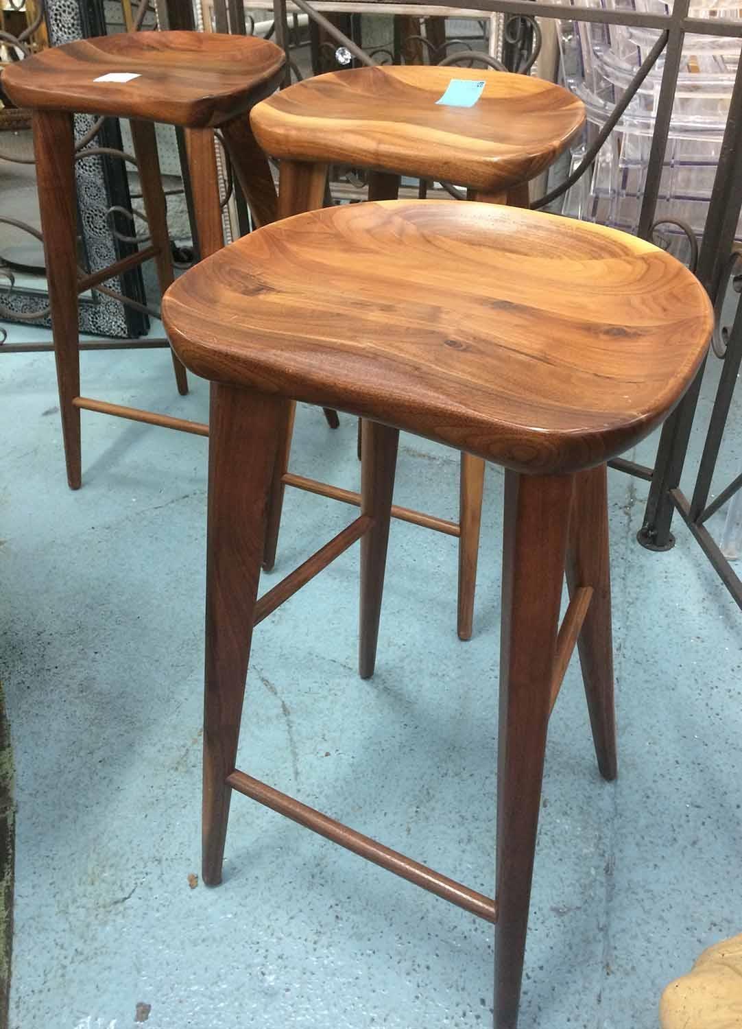 BARSTOOLS, a set of three, hardwood, shaped polished seats, 73cm H. (3)