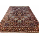 BAKTIAR CARPET, 368cm x 266cm, Country House style, all over tiled design, purchased in 1970.