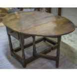 GATELEG TABLE, George I oak, circa 1720, with hinged oval top above a drawer to each end, 70cm H x