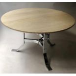 ATTRIBUTED TO MERROW ASSOCIATES DINING TABLE, circular travertine marble raised upon chrome