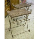 TRAY TABLES, a pair, metal, on folding stands, 73cm H x 62cm W x 41cm D. (2)