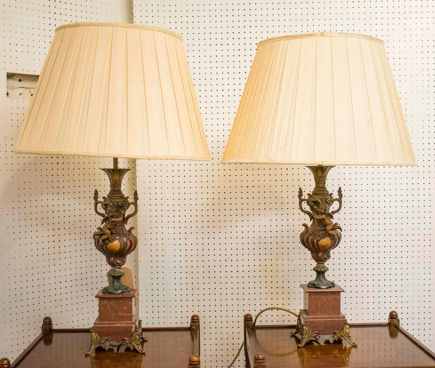 TABLE LAMPS, a pair, circa 1890, French patinated and gilt metal in the form of urns with cherub - Image 2 of 4