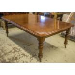 DINING TABLE, Victorian mahogany with extra leaf, brass castors and clips 73cm H x 133cm x 140cm