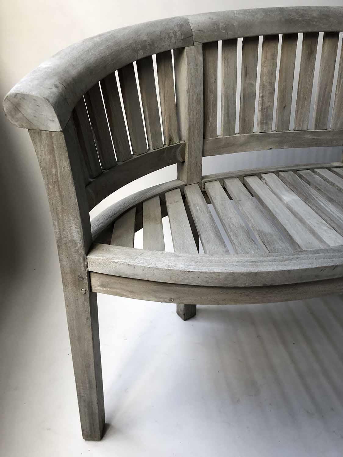 GARDEN BENCH, banana design, silvery weathered teak of bowed form and slatted construction, 160cm W. - Image 3 of 4