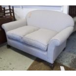 SOFA, two seater, with seat cushions in ticking material on castors, 157cm W.