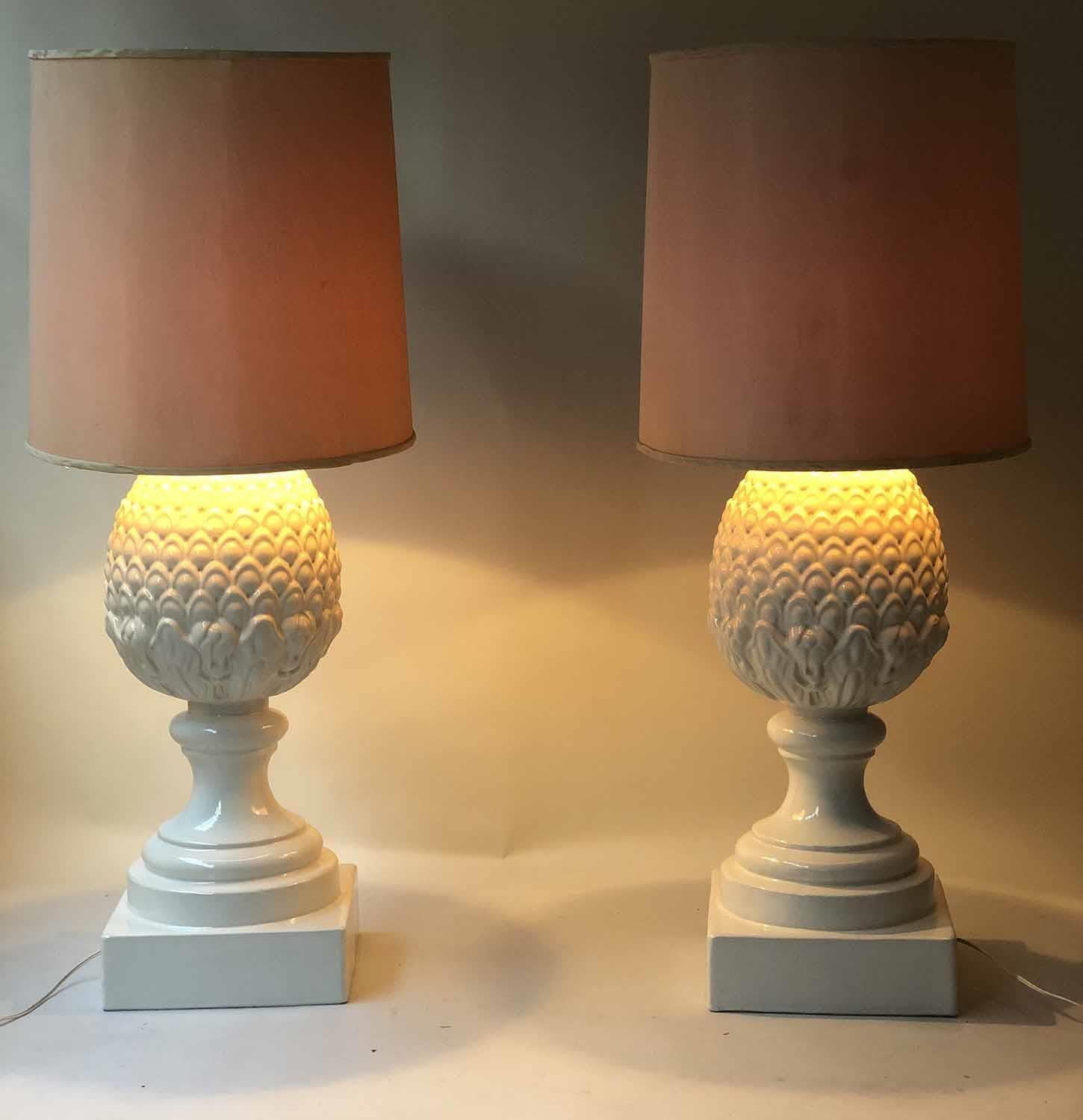 CASA PUPA PINEAPPLE LAMPS, a pair, large 1970's white ceramic pineapple on column with shades, 112cm