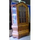 BOMBE DISPLAY CABINET, Dutch style walnut with glazed door enclosing shelves and three drawers