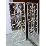 GARDEN WALL MIRRORS, a pair, white metal of rectangular trellis design, 128cm x 48cm. (2)