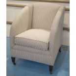 ARMCHAIR, Edwardian, in ticking fabric, with cushion seat and castors, 66cm W.
