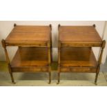BEDSIDE TABLES, a pair, Georgian style yewwood of two tiers, each with brushing slide and drawer