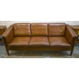 STOUBY DANISH SOFA, 1970's design teak and soft grained leather upholstered with seat, back and side
