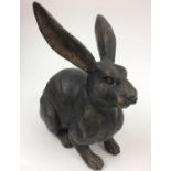 BRONZE RABBIT, a modelled hare and two bronze dogs, 22cm h x 20cm L. (4)