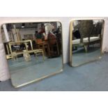 WALL MIRRORS, a pair, 1960's French style, gilt frames, 71cm x 71cm. (2)