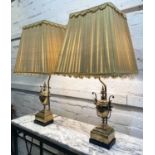 TABLE LAMPS, a pair, Neoclassical design brass urns raised on square ebonised bases with silk