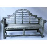 LUTYENS STYLE BENCH, silvery weathered and lichen covered teak after a design by Edwin Lutyens,