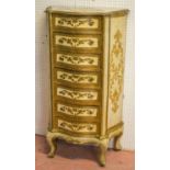 NARROW CHEST, Italianate, distressed cream painted and gilt wood, of serpentine form, with seven