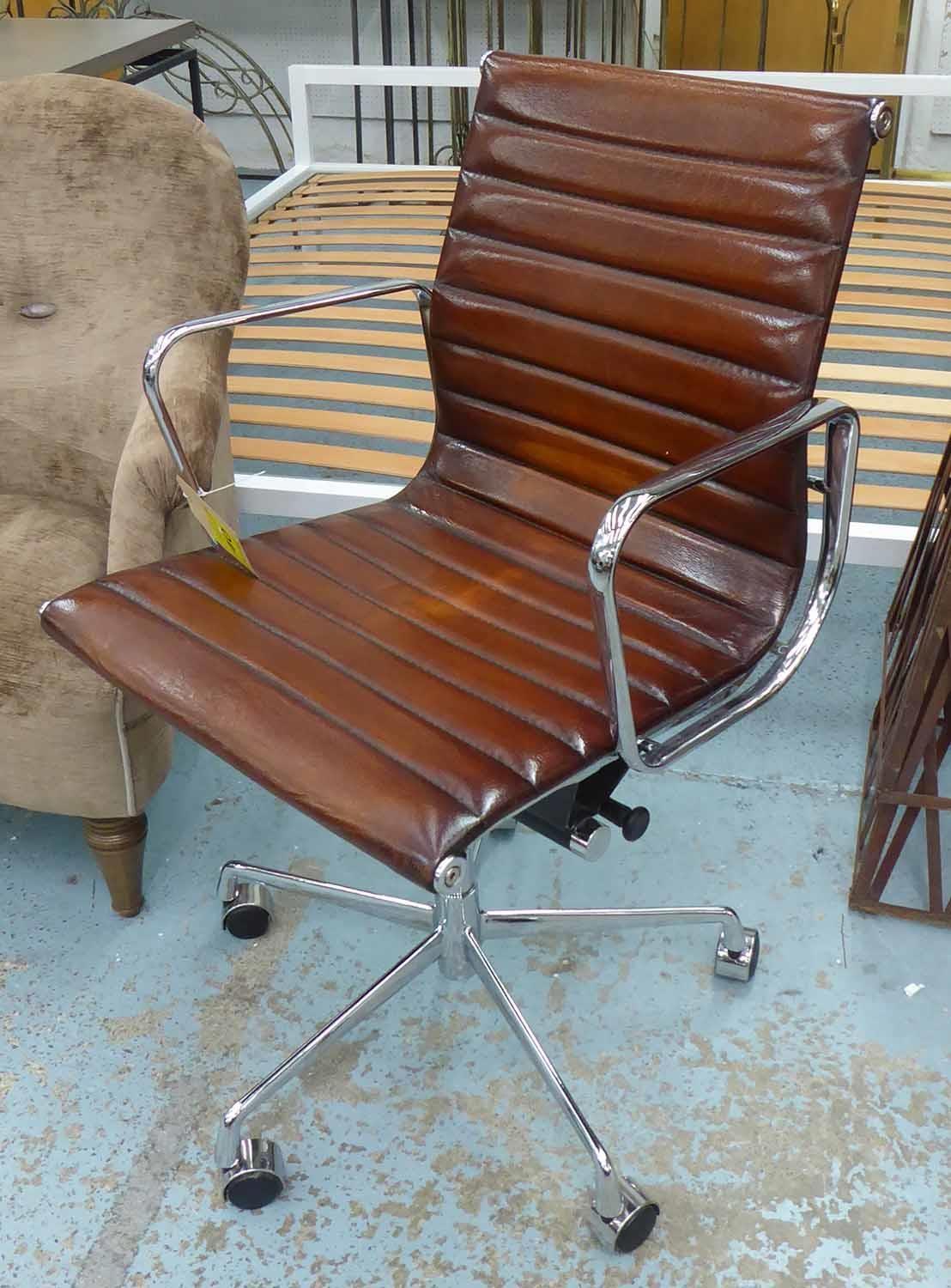 AFTER CHARLES AND RAY EAMES, aluminium group style desk chair, 100cm at tallest (with slight