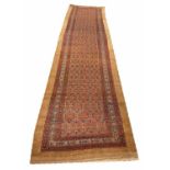 ANTIQUE NORTH WEST PERSIAN RUNNER, 380cm x 97cm.