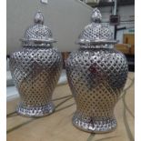 DECORATIVE PERFORATED TEMPLE JARS, a pair, with covers, contemporary ceramic, 64cm H. (2)