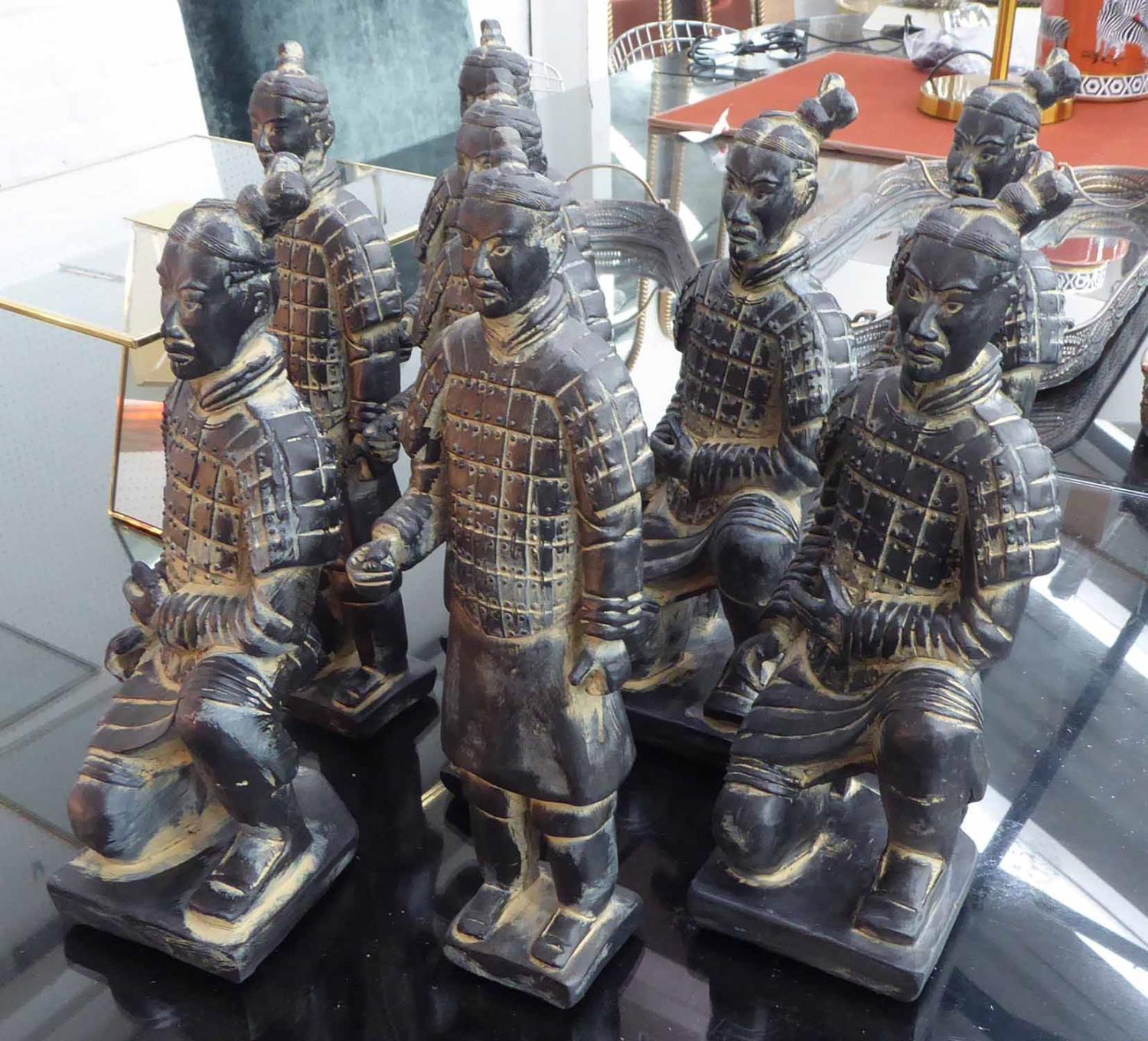 TABLE TOP FAUX TERRACOTTA CHINESE WARRIORS, a set of eight, various poses, largest 35cm. (8)