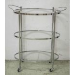 TROLLEY, chrome with three oval glass tiers, 84cm H x 73cm W x 36cm D.