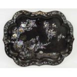 TOLEWARE TRAY, mid 19th century black japanned with mother of pearl inlay and scalloped edge, (old