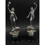 FIGURINES, a pair, French, early 20th century, Le Pouvoir and La Force on Bakelite bases, 35cm H. (