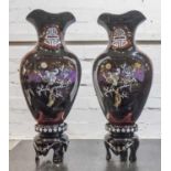 VASES, on stands, a pair, Oriental lacquered with inlaid detail. (2)