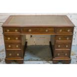 PEDESTAL DESK, Victorian mahogany with gilt tooled green leather top above nine drawers on