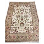 FINE FEREGHAN RUG, 230cm x 170cm, ivory palmette and vine field.