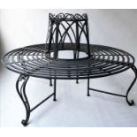 TREE BENCH, circular black painted metal and slatted with scroll upstand, 140cm diam x 90cm H,