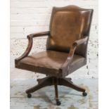 SWIVEL DESK CHAIR, Georgian style mahogany and beechwood in brown leather (seat slightly