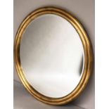 CIRCULAR WALL MIRROR, circular bevelled within a moulded giltwood frame, 100cm Diam.