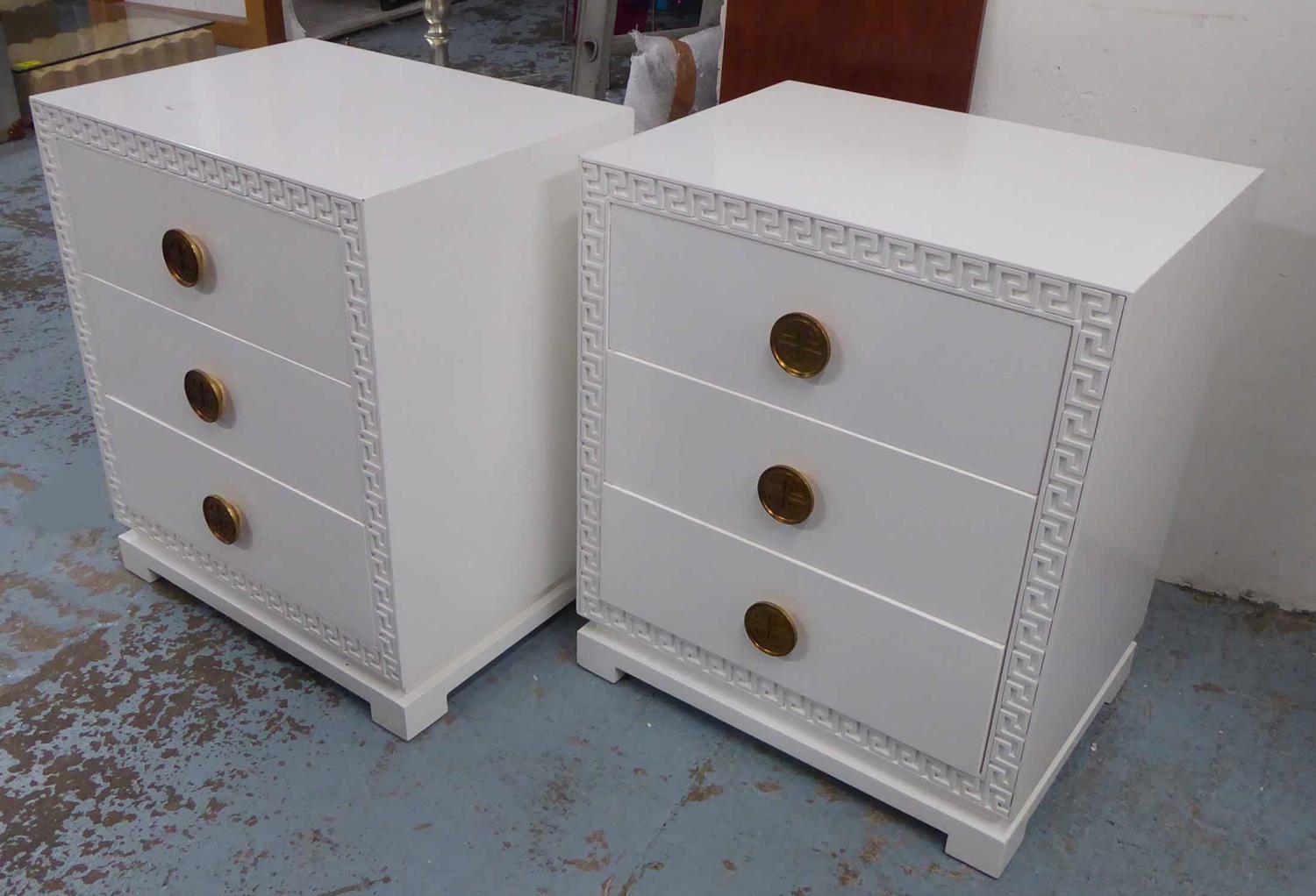 SIDE CHESTS, a pair, white with greek key border and two drawers with decorative handles, 71cm x