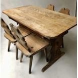 CHALET STYLE TABLE AND CHAIRS, rounded rectangular pine with trestle and drawer and four matching
