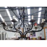 CHANDELIER, ten branch, contemporary worked metal, black painted with gilt accents, 195cm drop x