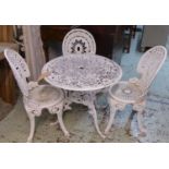 GARDEN TABLE, distressed white painted metal with four chairs to match, table 72cm Diam x 68cm H. (