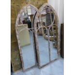 GARDEN MIRRORS, a set of three, Gothic arched metal frames, 122cm H x 56cm. (3)