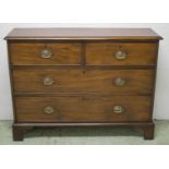 HALL CHEST, George III mahogany of adapted shallow proportions with two short and two long