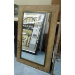 WALL MIRROR, contemporary, travertine frame with brass accent, 70cm x 110.5cm.