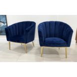 TUB ARMCHAIRS, a pair, Art Deco style Royal blue velvet chanelled rounded backs and gilt metal