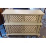 SIDE CABINET, Regency style painted of two graduated tiers with brass grille doors, 110cm W x 79cm H